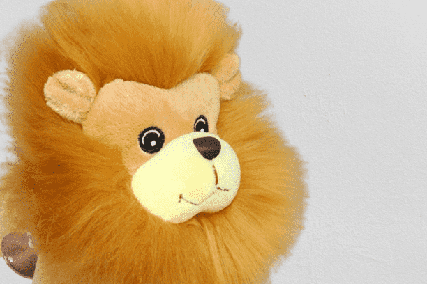 Orange Lying Lion Plush