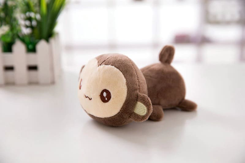 Peluche Singe Couché