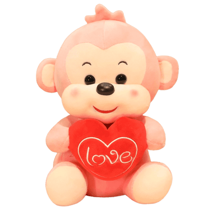 Peluche Singe Assis Tranquille Rose