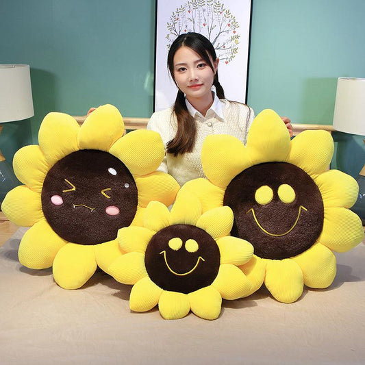 Mignons coussins tournesols expressifs