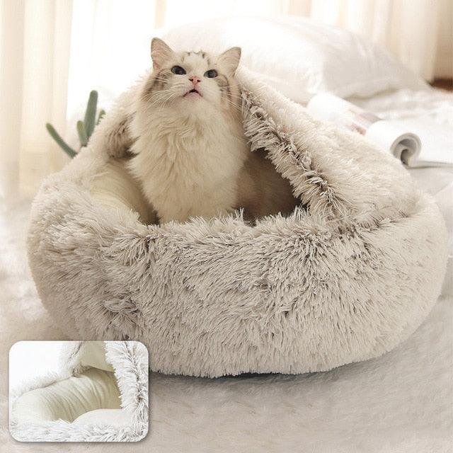 Lit adorable et douillet en forme de grotte pour chat