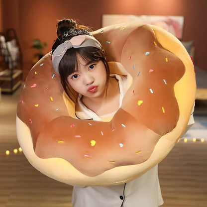 Giant plush donut cushions