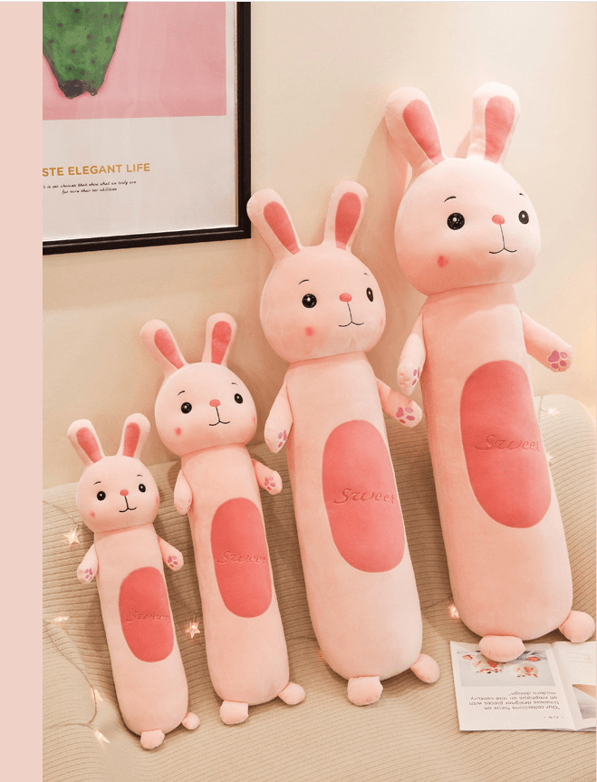 Plush doll with long, cylindrical pillow