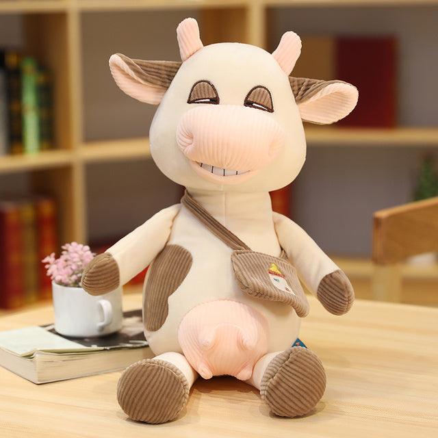 Peluche vache maladroite