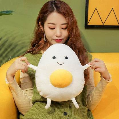 Plush pillow with egg and egg yolk