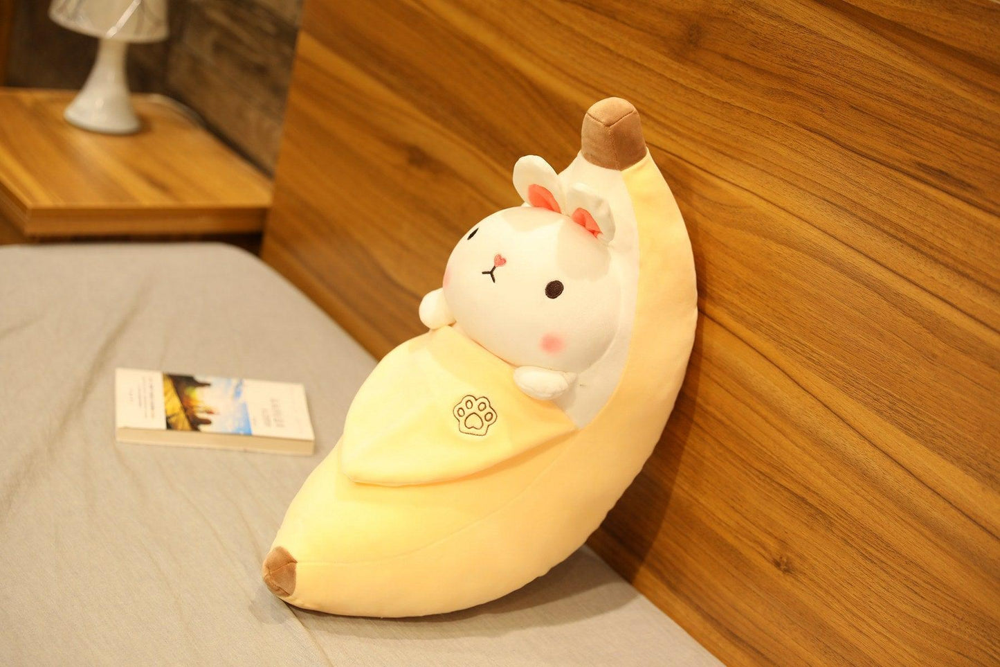Jouet peluche créatif en forme de cochon qui pèle les bananes