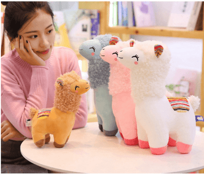 Very cute, cross-eyed and happy alpaca plush doll