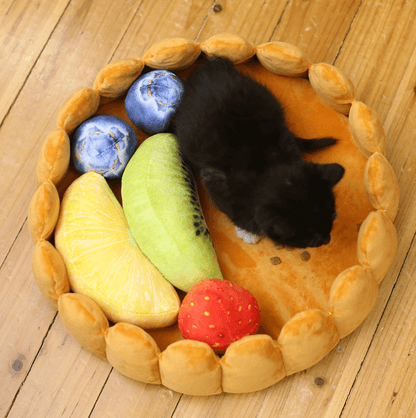 Lit pour chat et chien en forme d'ananas.