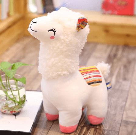 Very cute, cross-eyed and happy alpaca plush doll