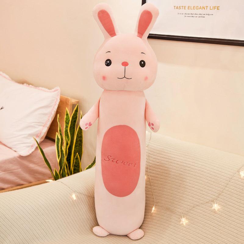 Plush doll with long, cylindrical pillow