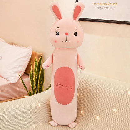 Plush doll with long, cylindrical pillow