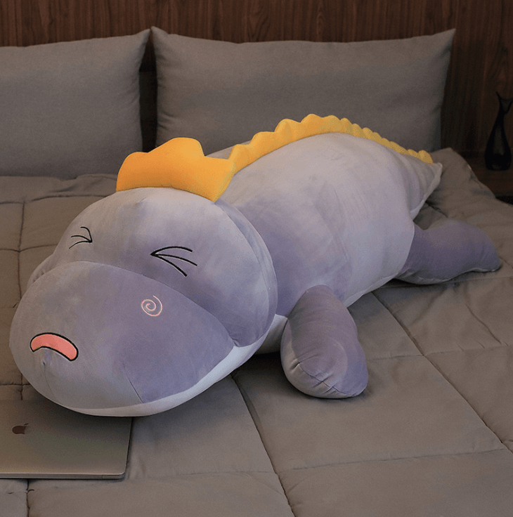 Plush dinosaur doll