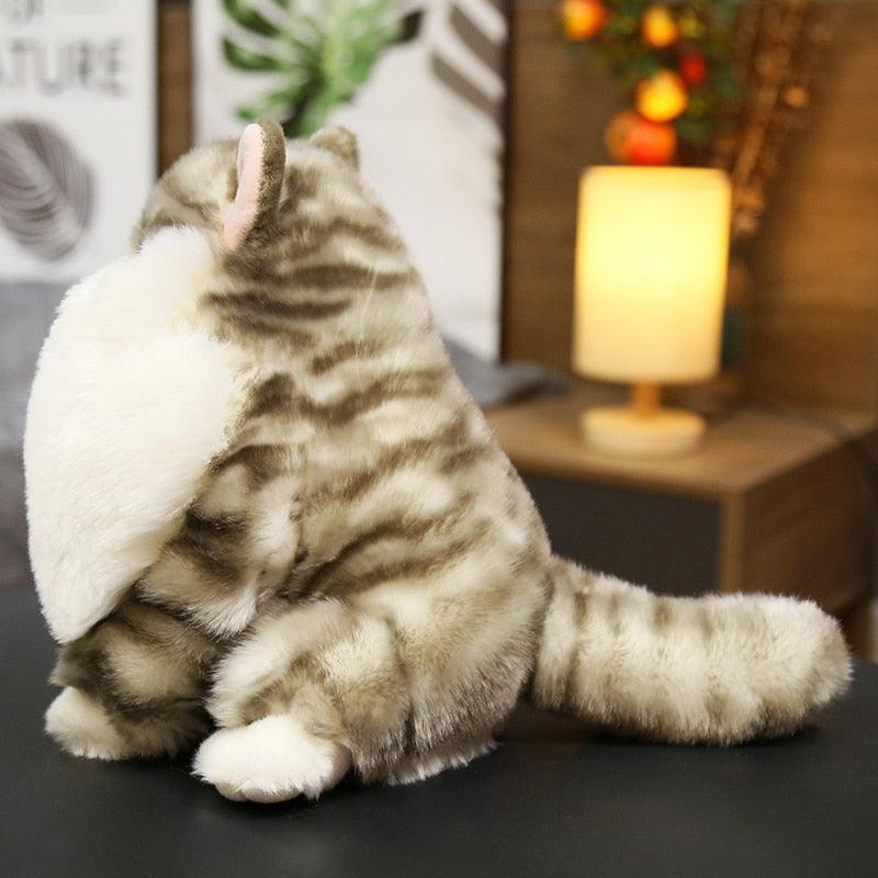 Adorable stuffed fuzzy maned cat