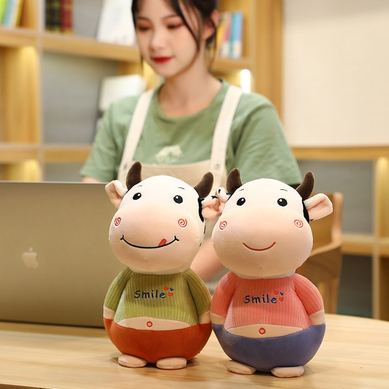 Smiling and happy cow plush toy