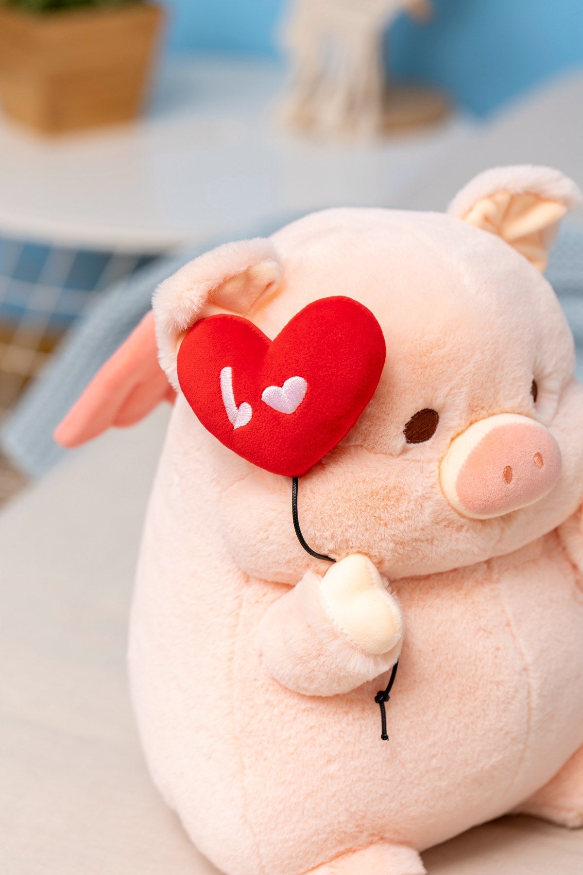 Plush Pig flying heart balloon