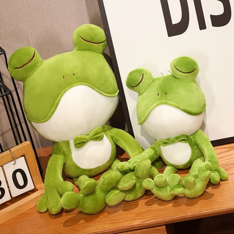 Sleeping green frog plush toy