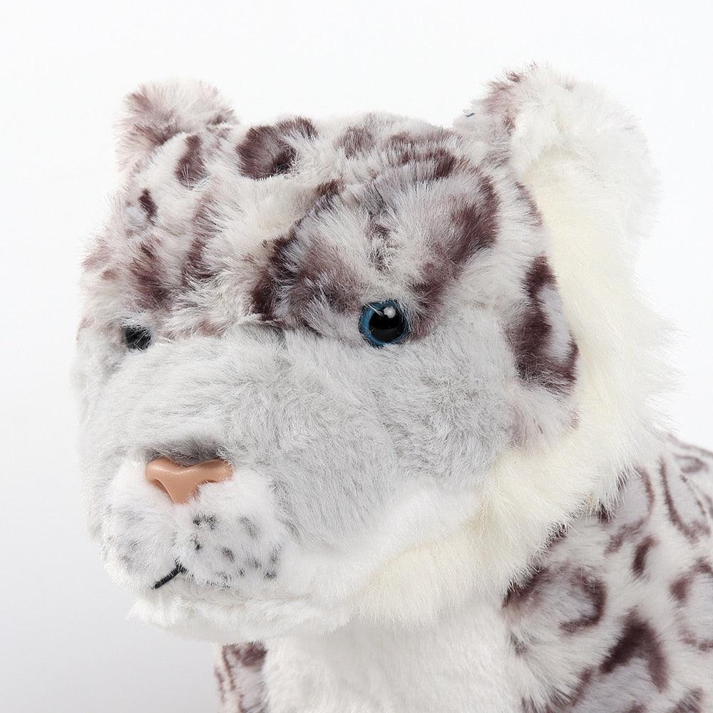 Adorable peluche léopard des neiges