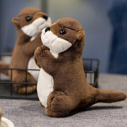 Adorable little otter-shaped soft toys