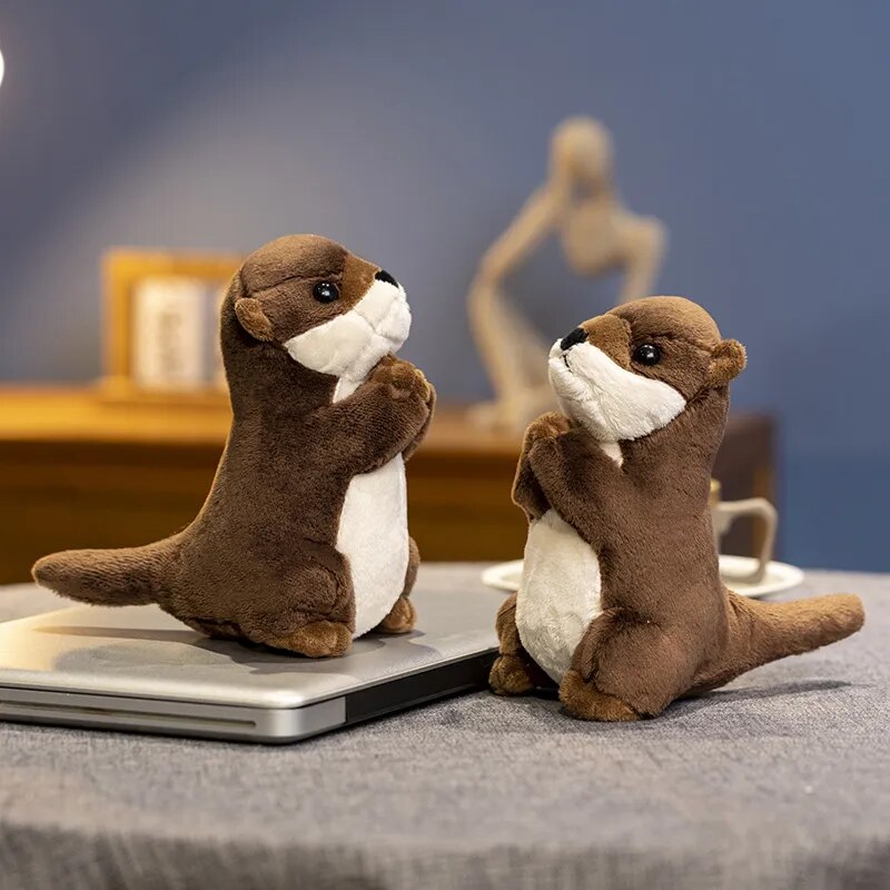 Adorable little otter-shaped soft toys