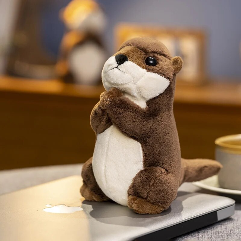 Adorable little otter-shaped soft toys