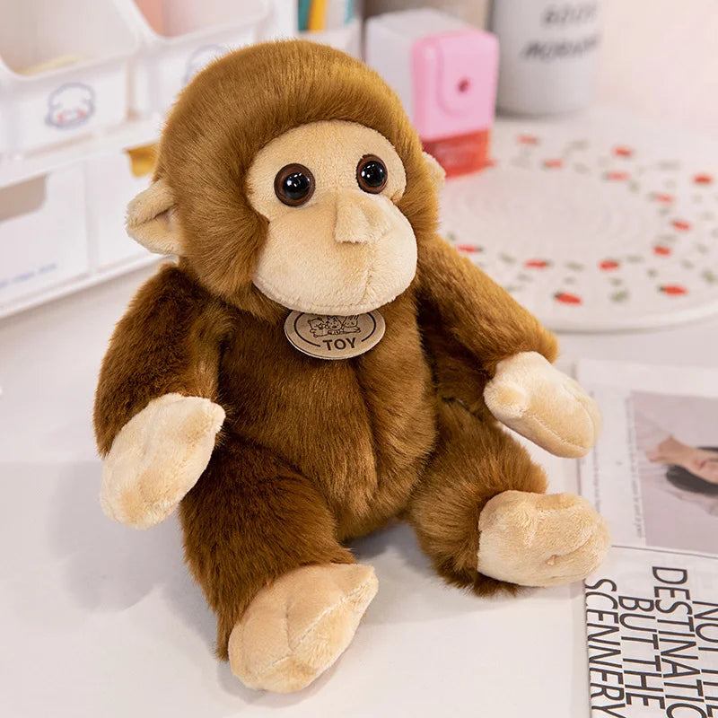 Mignonnes peluches de petit singe