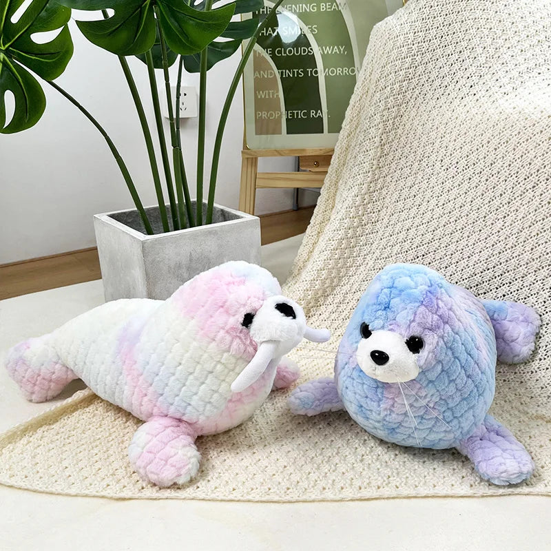 Colorful seal, sea lion and narwhal soft toys