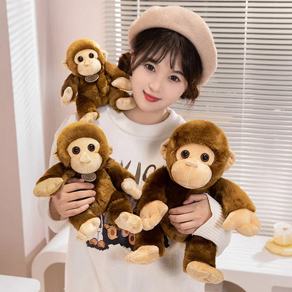 Mignonnes peluches de petit singe