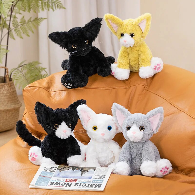 Fuzzy and colorful cat stuffed animals