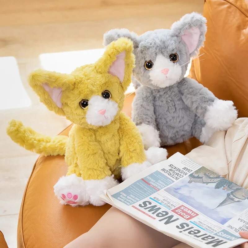 Fuzzy and colorful cat stuffed animals