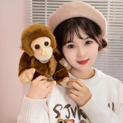 Mignonnes peluches de petit singe