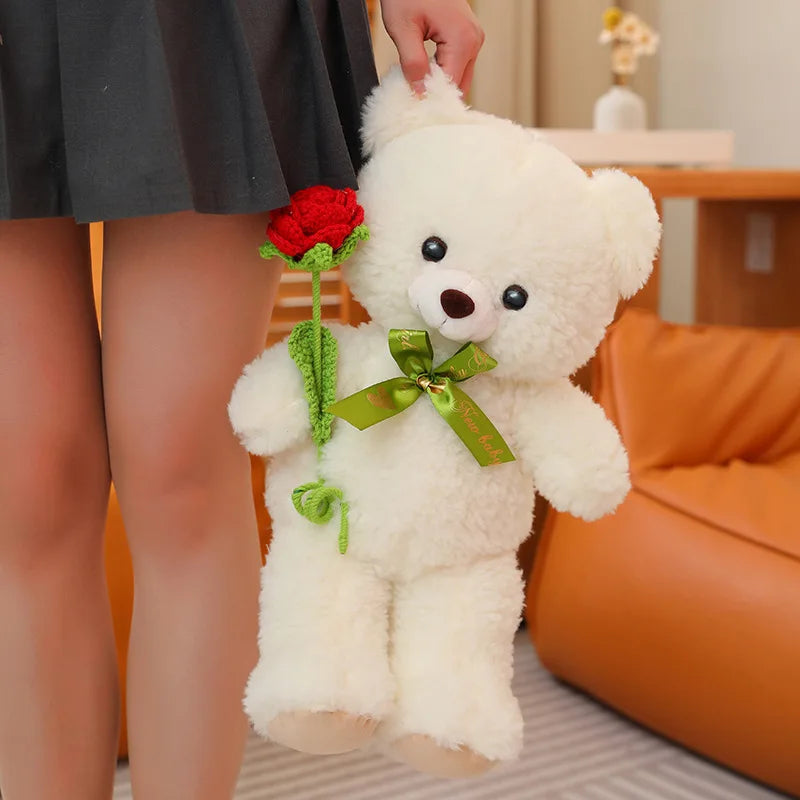 Teddy bear in love with flowers