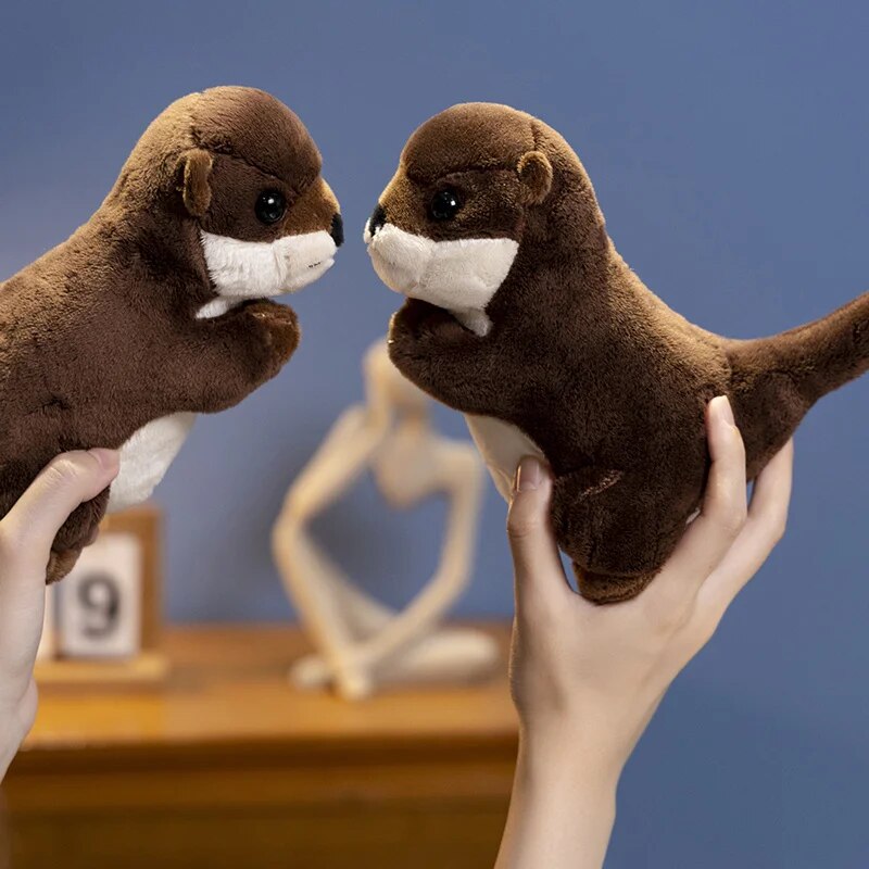 Adorable little otter-shaped soft toys