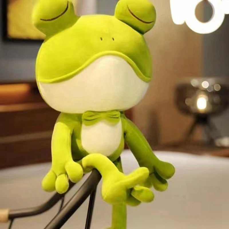 Sleeping green frog plush toy