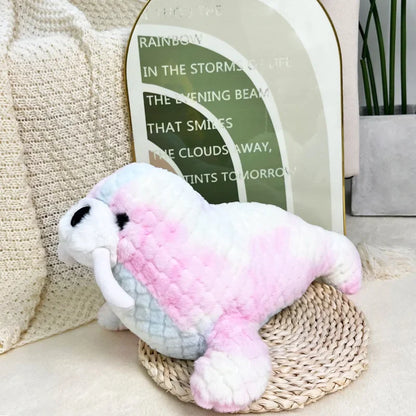 Colorful seal, sea lion and narwhal soft toys