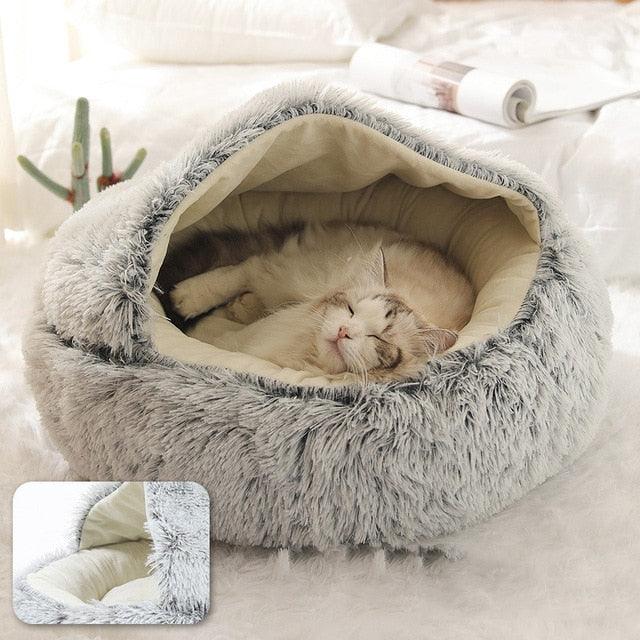 Adorable and cozy cave-shaped cat bed