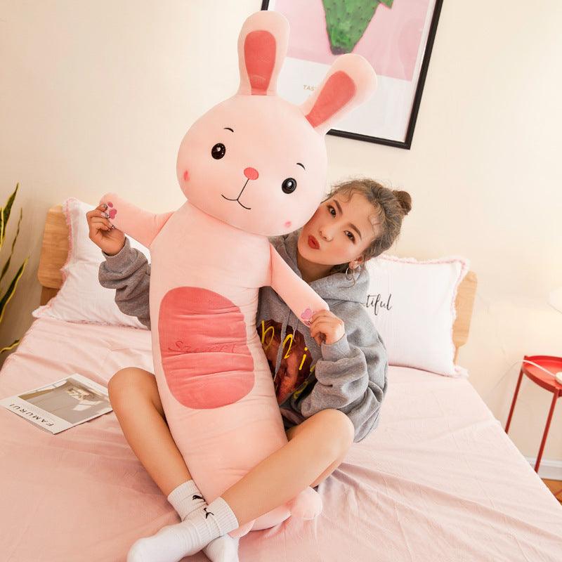 Plush doll with long, cylindrical pillow