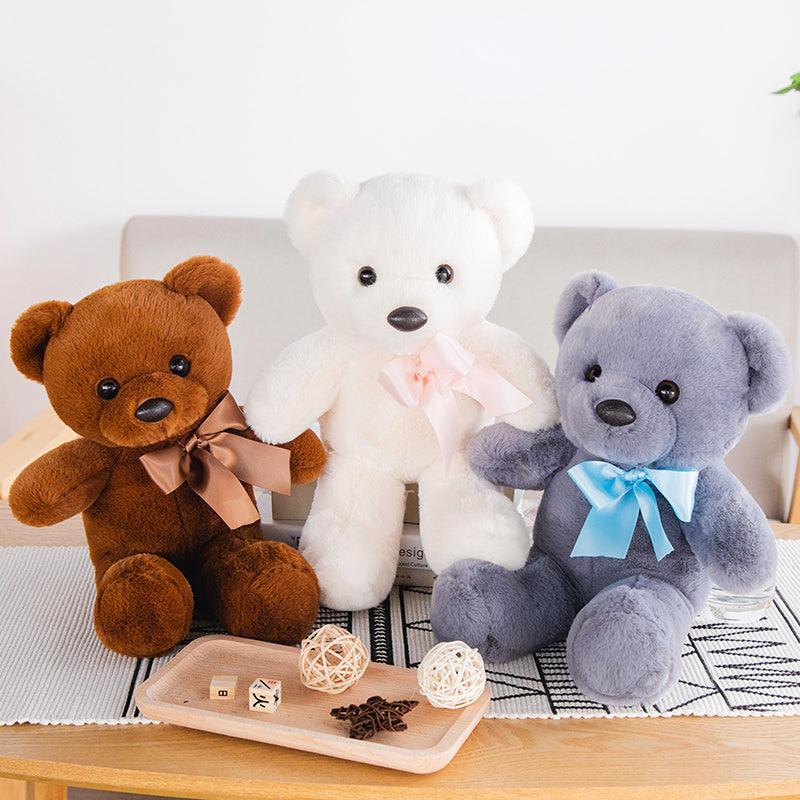 Jouets en peluche en forme d'ourson assis