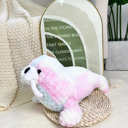 Colorful seal, sea lion and narwhal soft toys