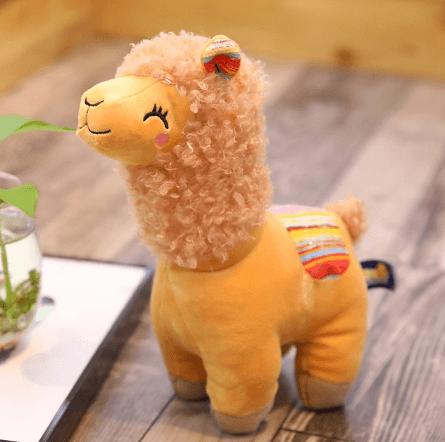 Very cute, cross-eyed and happy alpaca plush doll