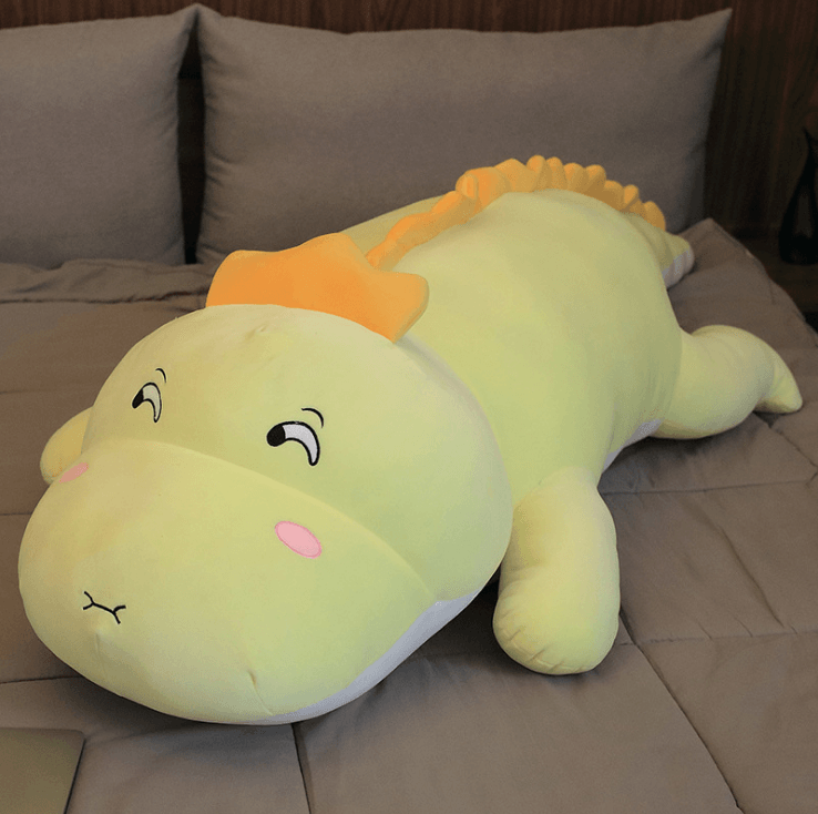 Poupée dinosaure en peluche