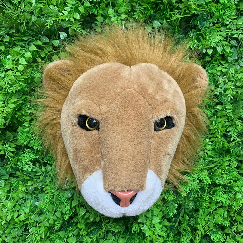 Poupée en peluche tête de lion