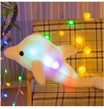 Luminous plush dolphin pillow