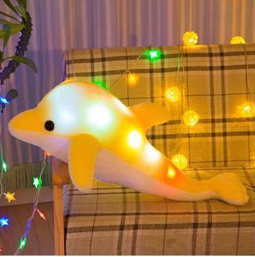 Luminous plush dolphin pillow