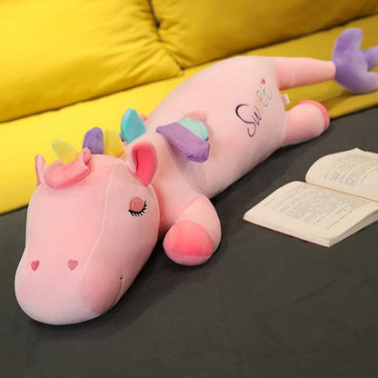 Large lying unicorn stuffed animal