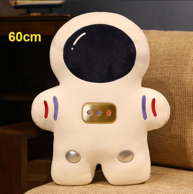 Creative stuffed pillows in the shape of space astronauts