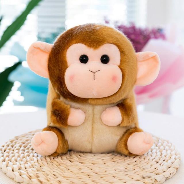 Peluche singe assis