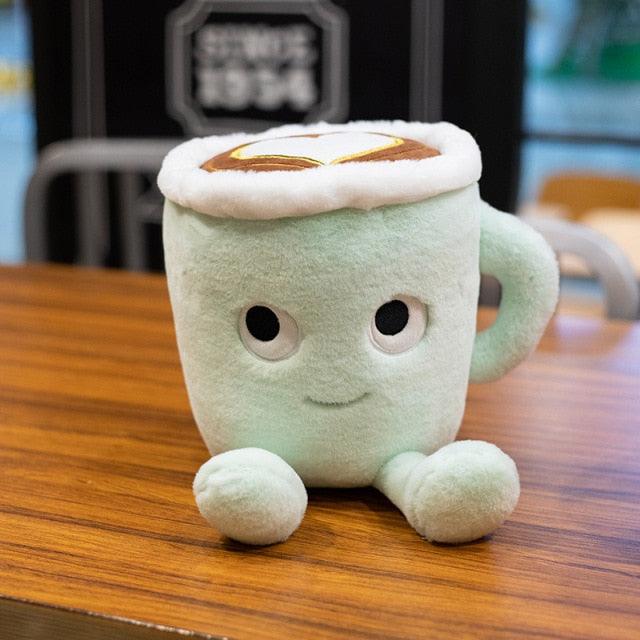 Matcha soft toys and cup of Latte coffee