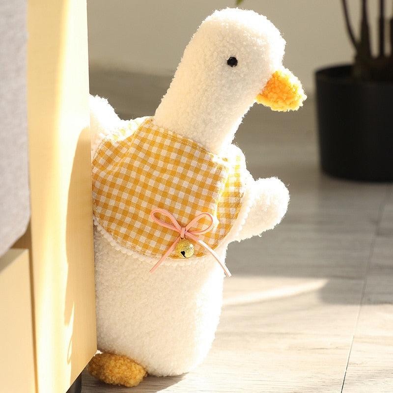 Jouet peluche bavoir bébé canard blanc