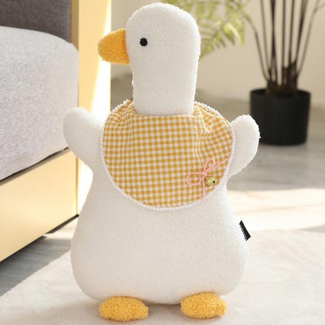 Jouet peluche bavoir bébé canard blanc