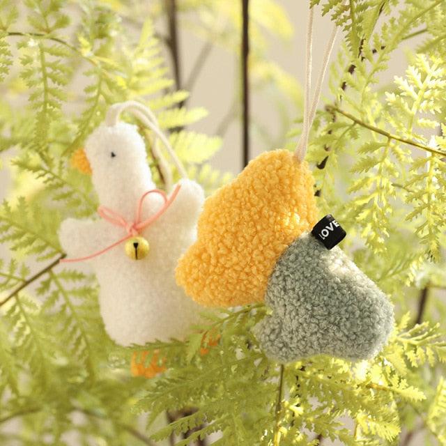 Jouet peluche bavoir bébé canard blanc